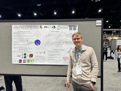 Presenting the LUNA poster at NeurIPS 2025 in San Diego.